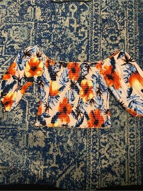 Love By Design Off-Shoulder Floral Smocked Crop Top in Orange and Blue